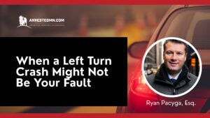 Banner for a law firm's article: logo 'ARRESTEDMN.COM' with a bison, large headline 'When a Left Turn Crash Might Not Be Your Fault,' and a circular portrait of Ryan Pacyga, Esq. on a red car background.